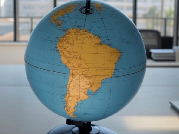 Imagem de globo terrestre destacando Portugal com símbolos de polarização e instabilidade global, em ambiente brasileiro.