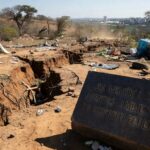Edifício da CLDF em Brasília com fundo de crise ambiental, representando homenagem tardia a agentes ambientais no DF.