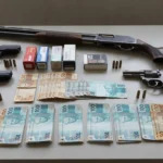 Armas, munições e dinheiro apreendidos pela PMDF e PMGO no Gama